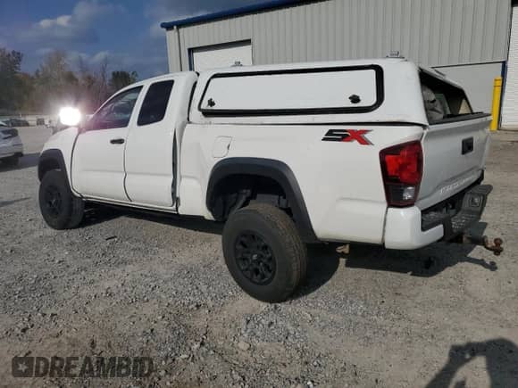 2022 Toyota Tacoma SR z VIN 3TYRZ5CN1NT014189, wystawiony jako Copart lot #81127735 z przebiegiem Nie podano mil oraz Szkoda całkowita • Salvage title. Historia ofert i sprzedaży dostępna na DreamBid. Obrazek 2.
