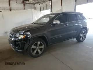 2015 Jeep Grand Cherokee Overland with VIN 1C4RJFCG8FC158061, listed as a Copart auction lot 80517975 with 115,889 mi miles and Salvage title. Bid and sale history available at DreamBid. Image 1.