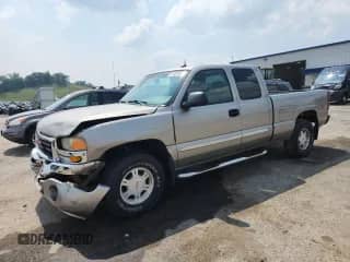 2003 GMC Sierra 1500 SLT with VIN 2GTEK19T931272591, listed as a Copart auction lot 67408295 with 168,494 mi miles and Salvage title. Bid and sale history available at DreamBid. Image 1.