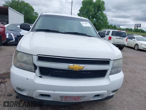 2010 Chevrolet Suburban LS z VIN 1GNUCHE09AR200640, wystawiony jako IAAI lot #42326053 z przebiegiem 218 327 mil mil oraz . Historia ofert i sprzedaży dostępna na DreamBid. Obrazek 12.