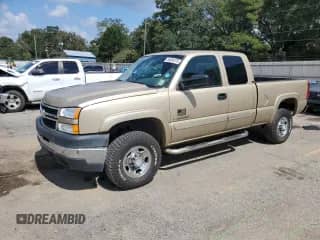 2006 Chevrolet Silverado 2500HD Work Truck with VIN 1GCHC29U46E282411, listed as a Copart auction lot 84884375 with 143,981 mi miles and Salvage title. Bid and sale history available at DreamBid. Image 1.
