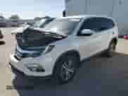2018 Honda Pilot EX with VIN 5FNYF5H35JB017165, listed as a Copart auction lot 58557435 with 83,302 mi miles and Salvage title. Bid and sale history available at DreamBid. Image 1.