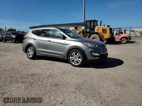2015 Hyundai Santa Fe z VIN 5XYZW4LA2FG241689, wystawiony jako Copart lot #70274325 z przebiegiem 110 901 mil mil oraz Szkoda całkowita • Salvage title. Historia ofert i sprzedaży dostępna na DreamBid. Obrazek 14.