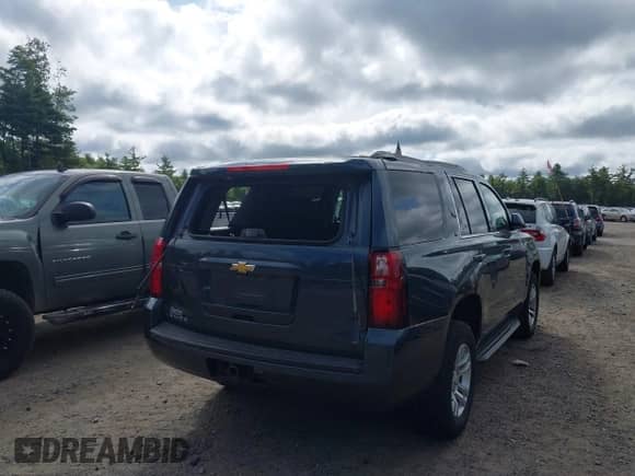 2019 Chevrolet Tahoe LT with VIN 1GNSKBKC7KR180041, listed as a IAAI auction lot 43191387 with 84,538 mi miles and . Bid and sale history available at DreamBid. Image 4.