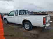1997 Nissan Frontier XE with VIN 1N6SD16S8VC426940, listed as a Copart auction lot 55860235 with 242,265 mi miles and Salvage title. Bid and sale history available at DreamBid. Image 2.