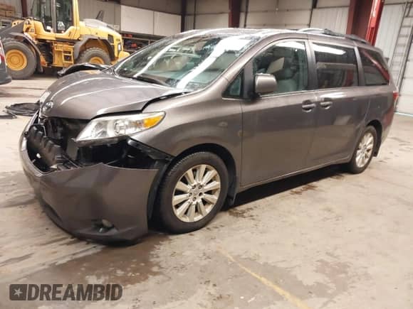 2015 Toyota Sienna Limited with VIN 5TDDK3DC4FS123467, listed as a IAAI auction lot 41977448 with 164,467 mi miles and . Bid and sale history available at DreamBid. Image 2.