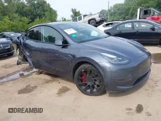 2022 Tesla Model Y Performance with VIN 7SAYGDEF0NF545923, listed as a IAAI auction lot 42903805 with 106,839 mi miles and . Bid and sale history available at DreamBid. Image 1.