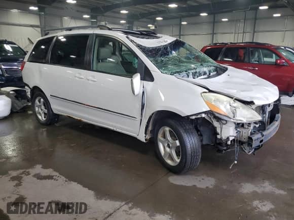 2006 Toyota Sienna XLE z VIN 5TDBA22C06S065249, wystawiony jako Copart lot #67028185 z przebiegiem 254 862 mil mil oraz Nie do naprawy • Non repairable. Historia ofert i sprzedaży dostępna na DreamBid. Obrazek 4.