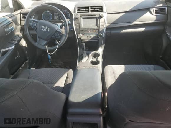 2017 Toyota Camry Hybrid XLE z VIN 4T1BD1FK7HU208050, wystawiony jako Copart lot #82497415 z przebiegiem 79 052 mil mil oraz Szkoda całkowita • Salvage title. Historia ofert i sprzedaży dostępna na DreamBid. Obrazek 8.