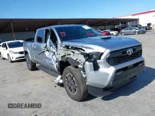 2024 Toyota Tacoma SR5 with VIN 3TMLB5JN5RM039515, listed as a IAAI auction lot 42416031 with 10,900 mi miles and . Bid and sale history available at DreamBid. Image 1.
