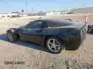2004 Chevrolet Corvette z VIN 1G1YY22G745133230, wystawiony jako Copart lot #84303785 z przebiegiem 92 127 mil mil oraz Szkoda całkowita • Salvage title. Historia ofert i sprzedaży dostępna na DreamBid. Obrazek 2.