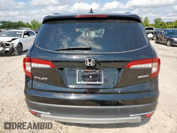 2022 Honda Pilot Touring 7-Passenger с VIN 5FNYF5H65NB002410, выставлен на аукционе Copart как лот 71237745 с пробегом 46 099 миль миль и Списание • Salvage title. История ставок и продаж доступна на DreamBid. Изображение 6.