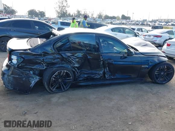 2015 BMW M3 with VIN WBS3C9C51FP806020, listed as a IAAI auction lot 41814551 with 106,647 mi miles and . Bid and sale history available at DreamBid. Image 13.