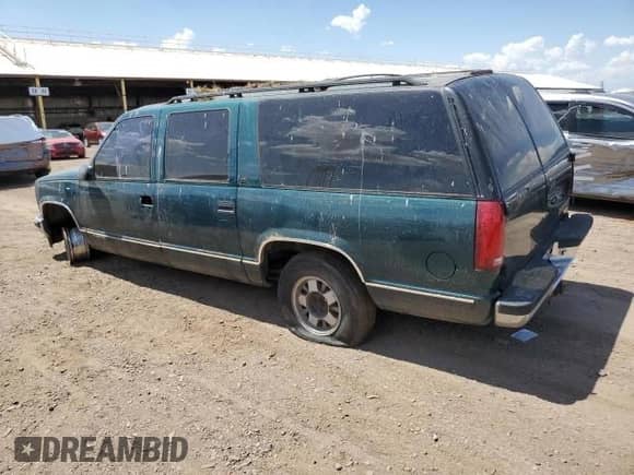 1997 Chevrolet Suburban с VIN 3GNEC16R6VG173251, выставлен на аукционе Copart как лот 66662655 с пробегом 295 543 миль миль и Чистый • Clean title. История ставок и продаж доступна на DreamBid. Изображение 2.