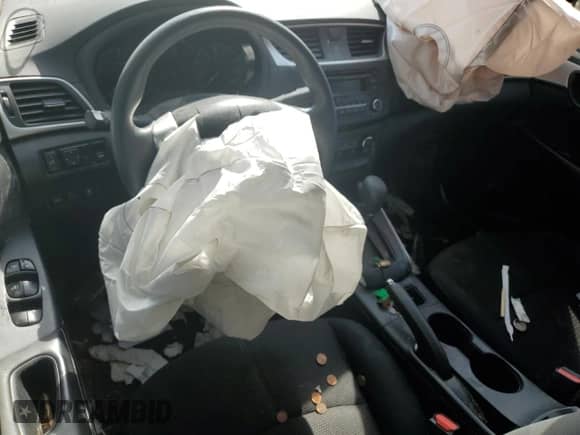 2017 Nissan Sentra S с VIN 3N1AB7AP6HY297394, выставлен на аукционе Copart как лот 72041695 с пробегом 50 388 миль миль и Списание • Salvage title. История ставок и продаж доступна на DreamBid. Изображение 8.