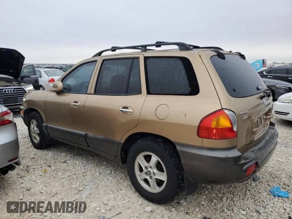 2002 Hyundai Santa Fe GLS z VIN KM8SC13D22U191206, wystawiony jako Copart lot #84965104 z przebiegiem 109 043 mil mil oraz Szkoda całkowita • Salvage title. Historia ofert i sprzedaży dostępna na DreamBid. Obrazek 2.