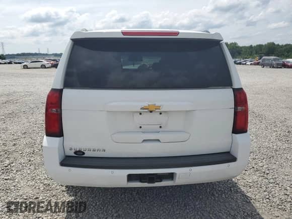 2020 Chevrolet Suburban LT z VIN 1GNSCHKC3LR167806, wystawiony jako Copart lot #59787085 z przebiegiem Nie podano mil oraz Szkoda całkowita • Salvage title. Historia ofert i sprzedaży dostępna na DreamBid. Obrazek 6.