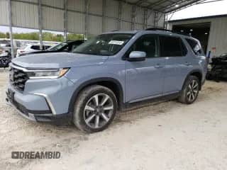 2023 Honda Pilot Elite z VIN 5FNYG1H85PB049348, wystawiony jako Copart lot #82314915 z przebiegiem 26 002 mil mil oraz Szkoda całkowita • Salvage title. Historia ofert i sprzedaży dostępna na DreamBid. Obrazek 1.