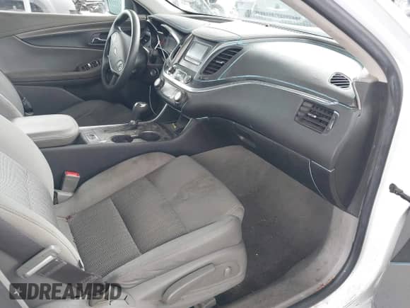 2016 Chevrolet Impala LS z VIN 1G11Z5SA8GU163312, wystawiony jako IAAI lot #43331173 z przebiegiem 144 984 mil mil oraz . Historia ofert i sprzedaży dostępna na DreamBid. Obrazek 5.