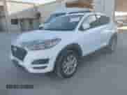 2019 Hyundai Tucson SE with VIN KM8J23A42KU031324, listed as a IAAI auction lot 43559076 with 124,556 mi miles and . Bid and sale history available at DreamBid. Image 2.