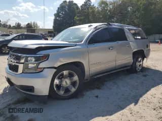 2018 Chevrolet Suburban LT z VIN 1GNSCHKC9JR237158, wystawiony jako Copart lot #83975075 z przebiegiem 142 981 mil mil oraz Szkoda całkowita • Salvage title. Historia ofert i sprzedaży dostępna na DreamBid. Obrazek 1.