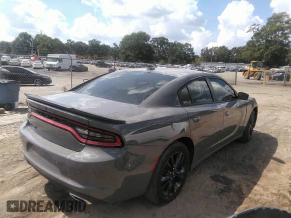 2023 Dodge Charger SXT with VIN 2C3CDXJG2PH706225, listed as a IAAI auction lot 43270116 with 10,839 mi miles and . Bid and sale history available at DreamBid. Image 4.