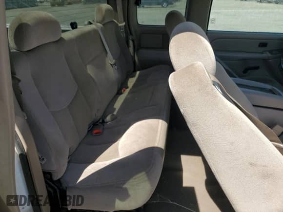 2006 GMC Sierra 1500 SLE1 z VIN 1GTEC19T56Z143921, wystawiony jako Copart lot #70602955 z przebiegiem 91 708 mil mil oraz Czysty tytuł • Clean title. Historia ofert i sprzedaży dostępna na DreamBid. Obrazek 10.
