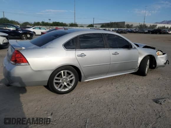 2012 Chevrolet Impala LTZ с VIN 2G1WC5E38C1114993, выставлен на аукционе Copart как лот 70210335 с пробегом 125 319 миль миль и Списание • Salvage title. История ставок и продаж доступна на DreamBid. Изображение 3.