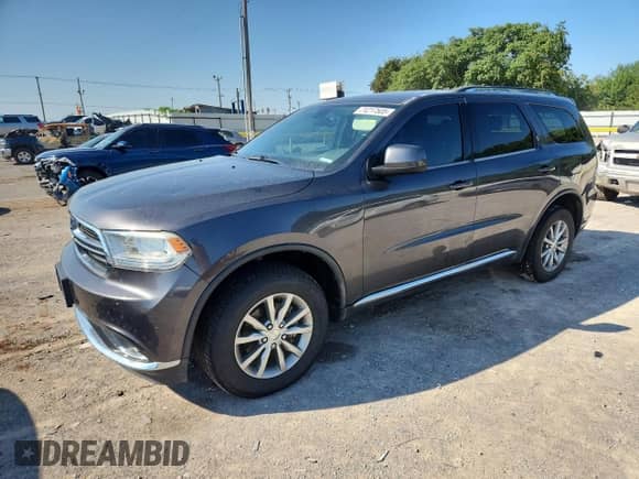2017 Dodge Durango SXT with VIN 1C4RDJAG2HC691510, listed as a Copart auction lot 71217505 with 95,876 mi miles and Salvage title. Bid and sale history available at DreamBid. Image 1.