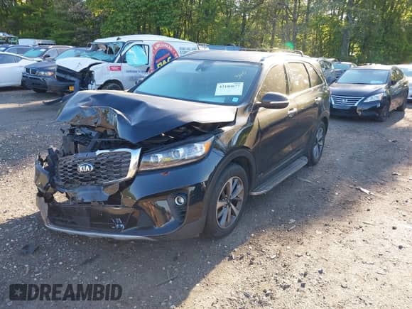 2019 Kia Sorento EX with VIN 5XYPHDA52KG466132, listed as a IAAI auction lot 42180877 with 63,449 mi miles and . Bid and sale history available at DreamBid. Image 2.