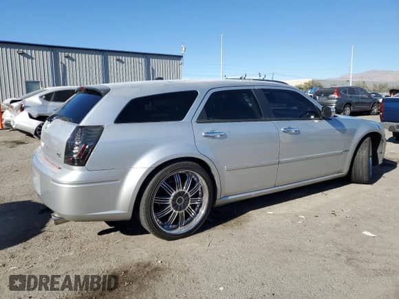 2006 Dodge Magnum R/T с VIN 2D8GV57286H122762, выставлен на аукционе Copart как лот 83399984 с пробегом 200 443 миль миль и Списание • Salvage title. История ставок и продаж доступна на DreamBid. Изображение 3.
