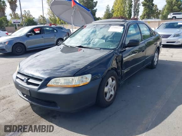2000 Honda Accord EX with VIN 1HGCG1657YA093379, listed as a IAAI auction lot 43408025 with 259,240 mi miles and . Bid and sale history available at DreamBid. Image 2.