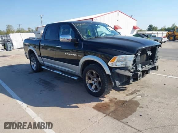 2012 Ram 1500 Laramie with VIN 1C6RD7NT5CS306229, listed as a IAAI auction lot 43373111 with 227,543 mi miles and . Bid and sale history available at DreamBid. Image 1.