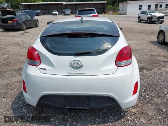 2015 Hyundai Veloster with VIN KMHTC6ADXFU232692, listed as a IAAI auction lot 42407054 with 80,745 mi miles and . Bid and sale history available at DreamBid. Image 16.