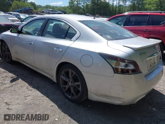 2014 Nissan Maxima SV z VIN 1N4AA5AP6EC470295, wystawiony jako IAAI lot #42551564 z przebiegiem 191 814 mil mil oraz . Historia ofert i sprzedaży dostępna na DreamBid. Obrazek 3.