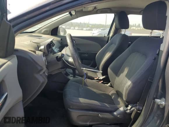 2013 Chevrolet Sonic LT with VIN 1G1JC5SB2D4144499, listed as a Copart auction lot 67112675 with 210,118 mi miles and Clean title. Bid and sale history available at DreamBid. Image 7.