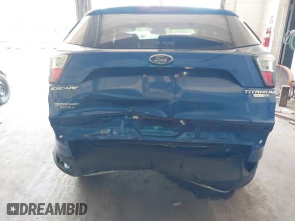 2017 Ford Escape Titanium with VIN 1FMCU9JD3HUA48471, listed as a IAAI auction lot 42686659 with 101,782 mi miles and . Bid and sale history available at DreamBid. Image 16.
