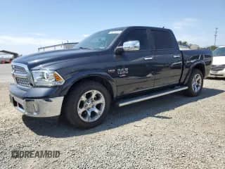 2014 Ram 1500 Laramie with VIN 1C6RR6NT1ES257108, listed as a Copart auction lot 70370345 with 104,098 mi miles and Salvage title. Bid and sale history available at DreamBid. Image 1.