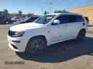 2014 Jeep Grand Cherokee SRT-8 с VIN 1C4RJFDJ2EC542278, выставлен на аукционе Copart как лот 87069095 с пробегом 145 108 миль миль и Чистый • Clean title. История ставок и продаж доступна на DreamBid. Изображение 1.