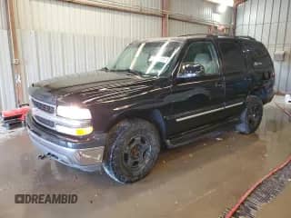 2005 Chevrolet Tahoe LS with VIN 1GNEK13T35J196858, listed as a Copart auction lot 82477955 with 359,513 mi miles and Salvage title. Bid and sale history available at DreamBid. Image 1.