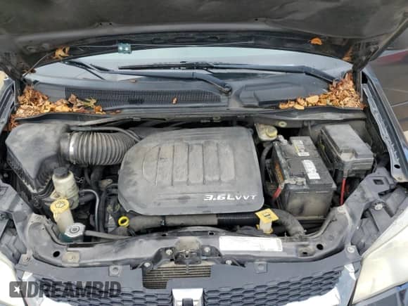 2011 Dodge Grand Caravan Crew with VIN 2D4RN5DG5BR661984, listed as a Copart auction lot 84283565 with 243,522 mi miles and Clean title. Bid and sale history available at DreamBid. Image 12.