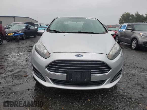2014 Ford Fiesta S z VIN 3FADP4AJ9EM239942, wystawiony jako Copart lot #81122575 z przebiegiem 128 404 mil mil oraz Szkoda całkowita • Salvage title. Historia ofert i sprzedaży dostępna na DreamBid. Obrazek 5.