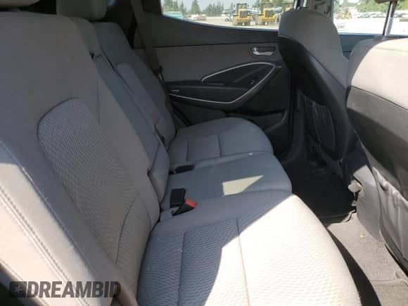 2016 Hyundai Santa Fe with VIN 5XYZTDLB9GG374517, listed as a Copart auction lot 70869645 with 63,795 mi miles and Salvage title. Bid and sale history available at DreamBid. Image 11.