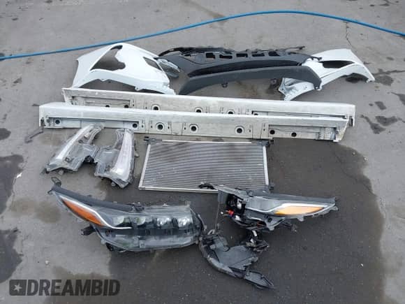 2021 Toyota Prius XLE with VIN JTDKAMFP6M3194992, listed as a IAAI auction lot 43311948 with 96,751 mi miles and . Bid and sale history available at DreamBid. Image 12.