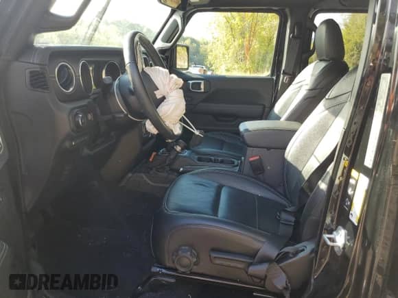 2023 Jeep Wrangler Sahara with VIN 1C4JJXP63PW513576, listed as a Copart auction lot 81793795 with 41,387 mi miles and Salvage title. Bid and sale history available at DreamBid. Image 7.