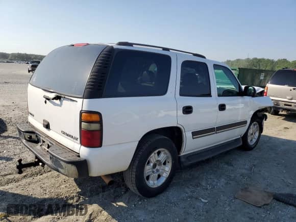 2005 Chevrolet Tahoe LS с VIN 1GNEC13V65R149100, выставлен на аукционе Copart как лот 61179975 с пробегом 283 123 миль миль и Списание • Salvage title. История ставок и продаж доступна на DreamBid. Изображение 3.