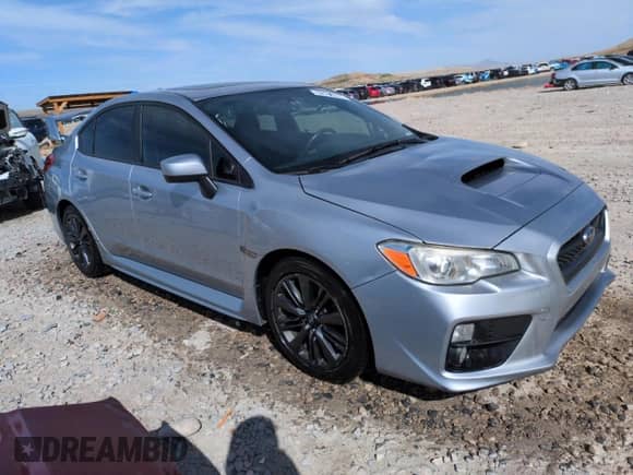 2015 Subaru WRX Premium with VIN JF1VA1D64F8818564, listed as a Copart auction lot 52196075 with 137,652 mi miles and Salvage title. Bid and sale history available at DreamBid. Image 4.