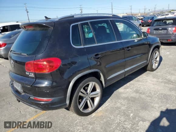 2015 Volkswagen Tiguan SEL z VIN WVGBV7AX1FW504346, wystawiony jako Copart lot #85332635 z przebiegiem 89 744 mil mil oraz Szkoda całkowita • Salvage title. Historia ofert i sprzedaży dostępna na DreamBid. Obrazek 3.