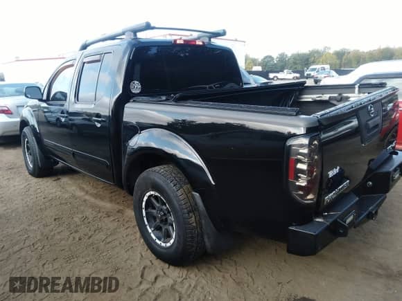 2013 Nissan Frontier SL with VIN 1N6AD0EV1DN717607, listed as a IAAI auction lot 43197727 with 134,518 mi miles and . Bid and sale history available at DreamBid. Image 3.