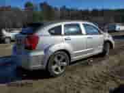 2011 Dodge Caliber Uptown z VIN 1B3CB9HB7BD294754, wystawiony jako Copart lot #88860555 z przebiegiem 134 249 mil mil oraz Szkoda całkowita • Salvage title. Historia ofert i sprzedaży dostępna na DreamBid. Obrazek 3.